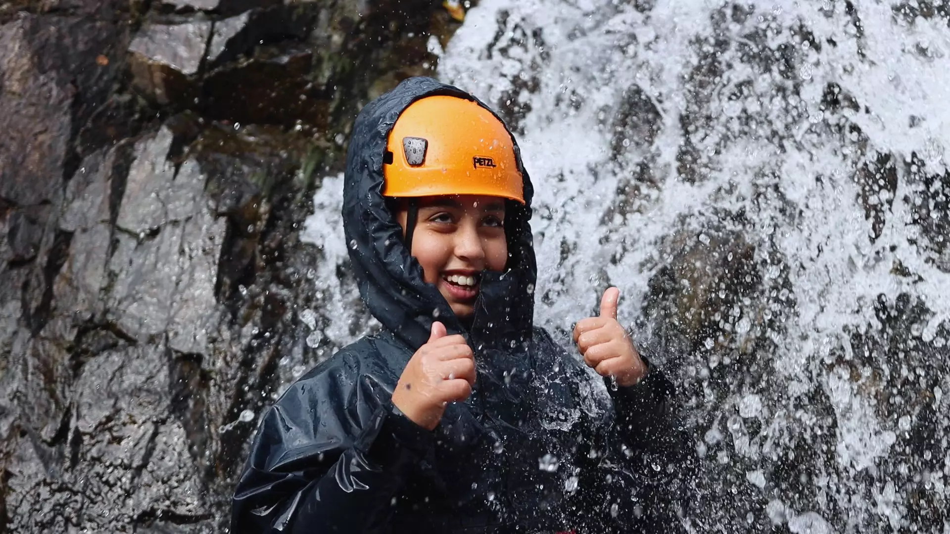 Girl in a waterfall