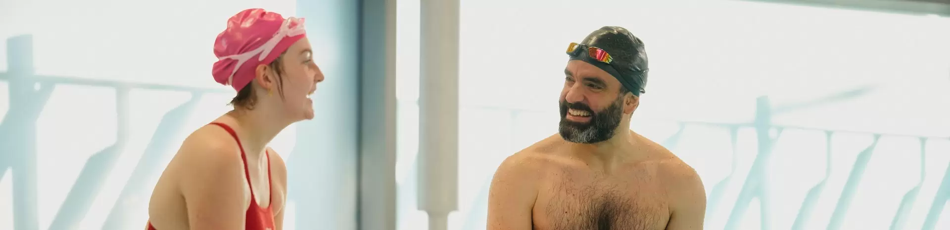 Man smiling on the pool. 