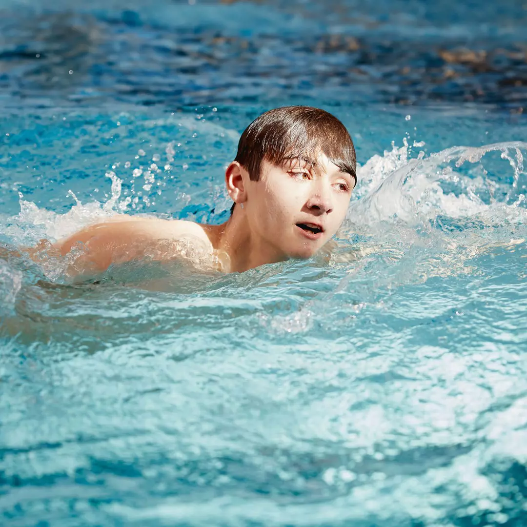 boy swimming