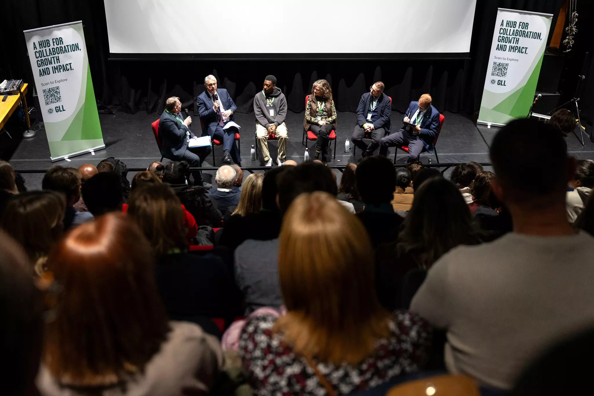 People sitting and and listening to the panel during Social Enterprise Day.