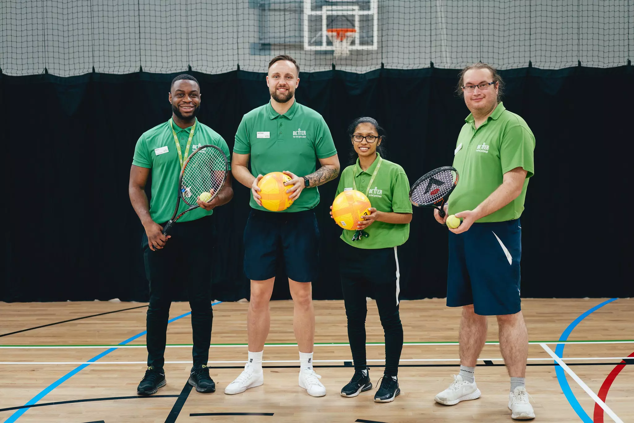 People standing in sports hall