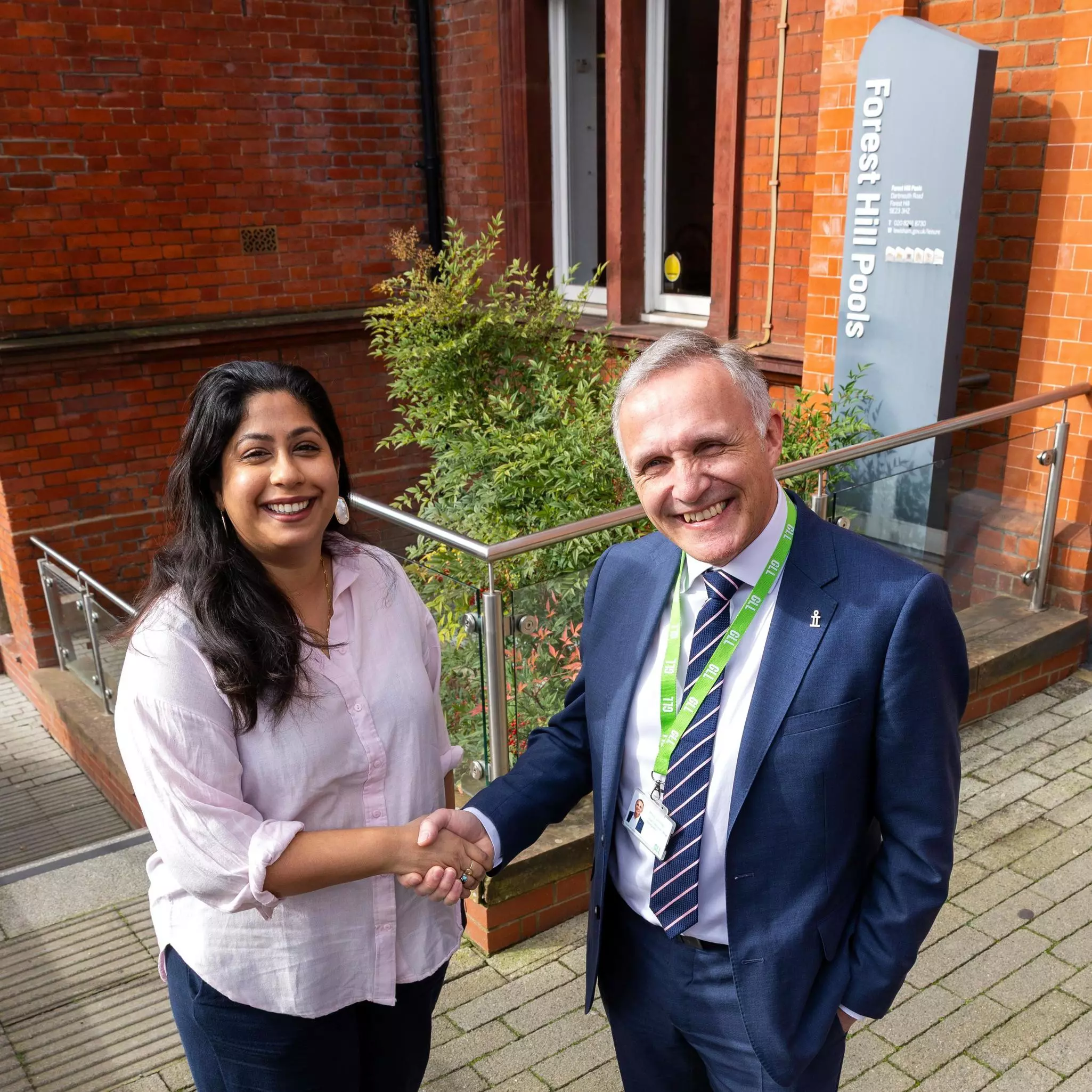 Man and woman shaking hands