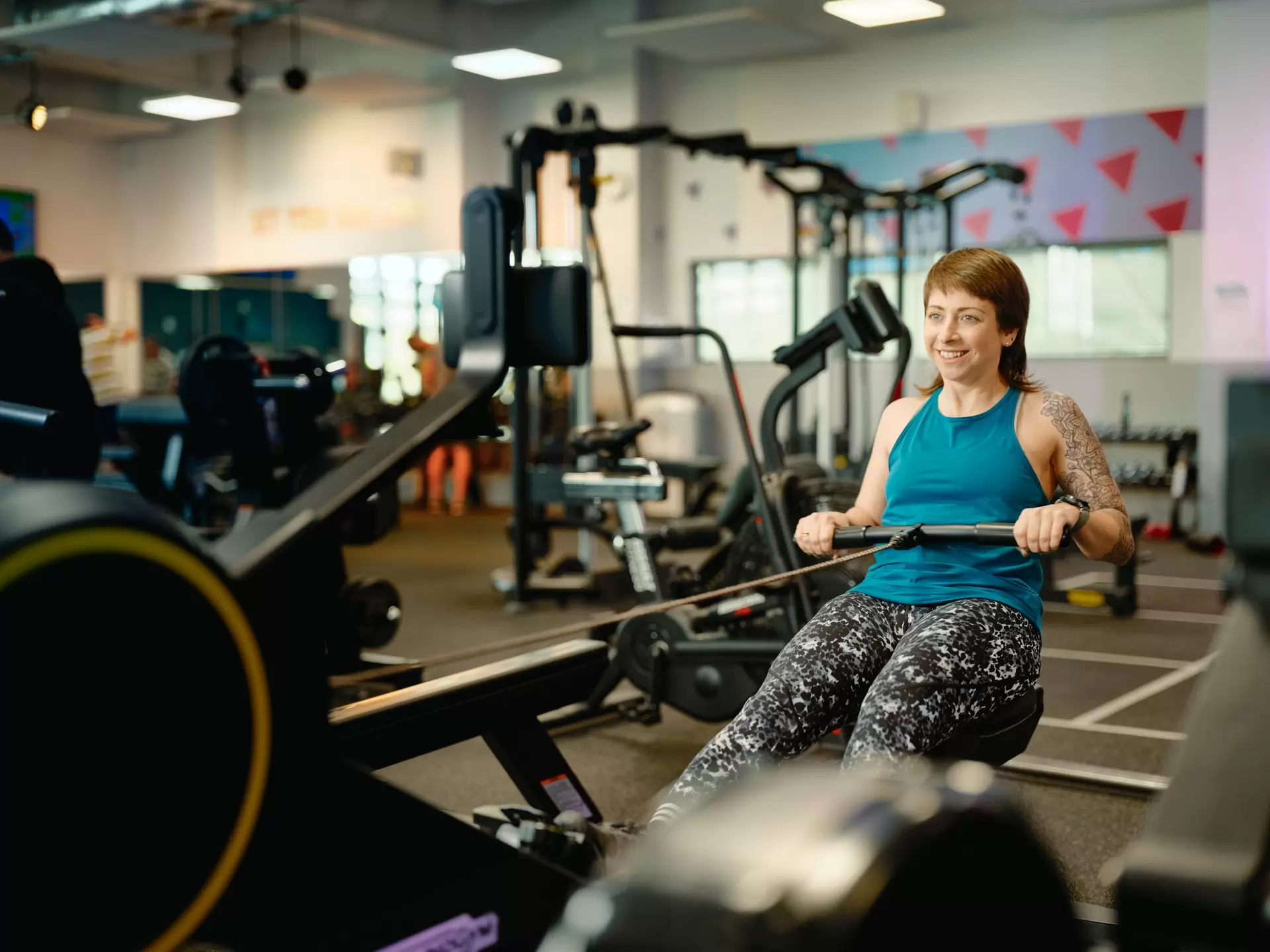 Woman on rowing machine