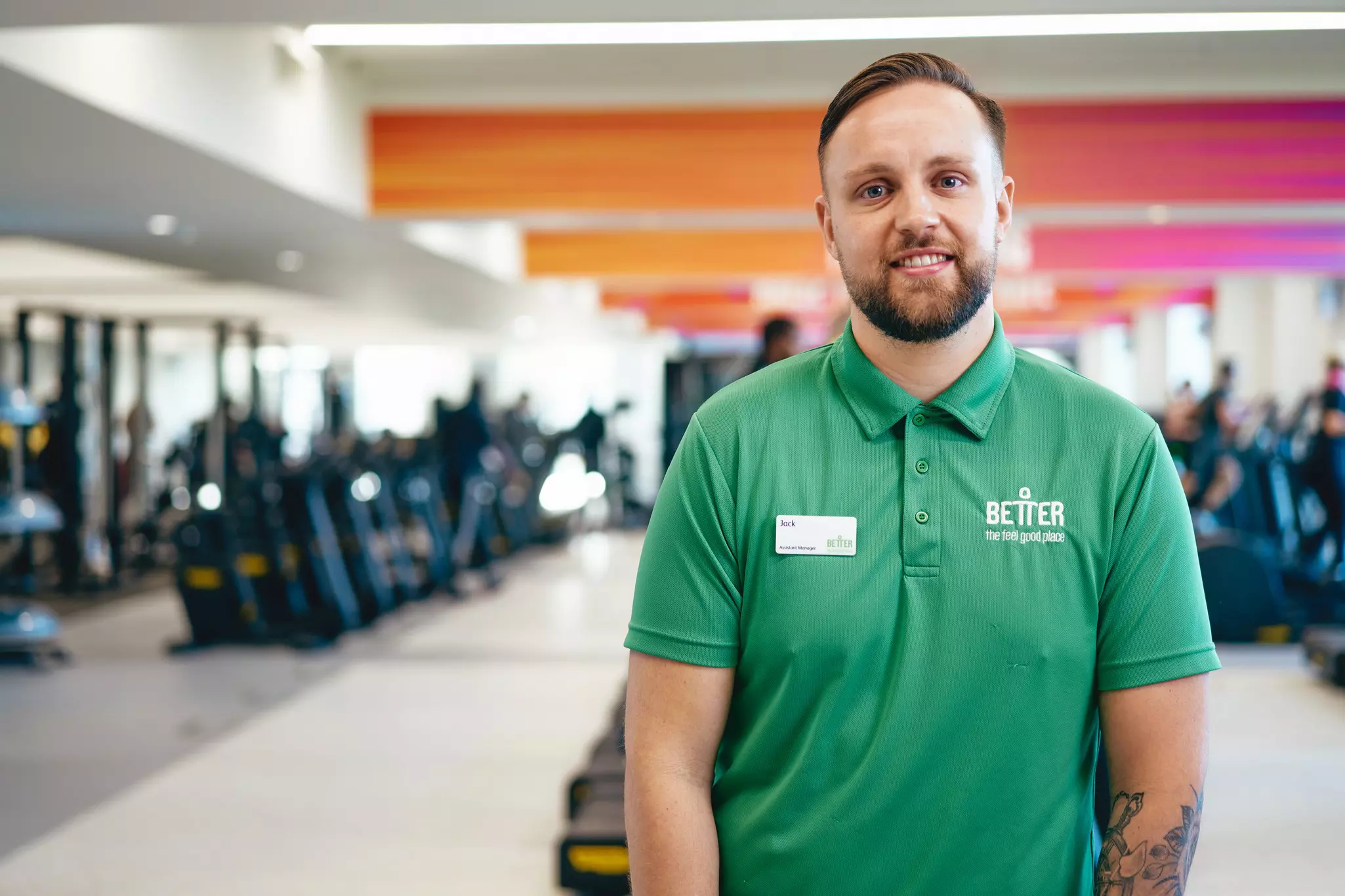 GLL staff standing in gym space.