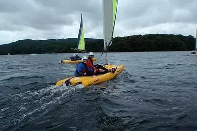 Two yellow boats on a lake