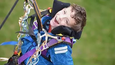 Boy in harness