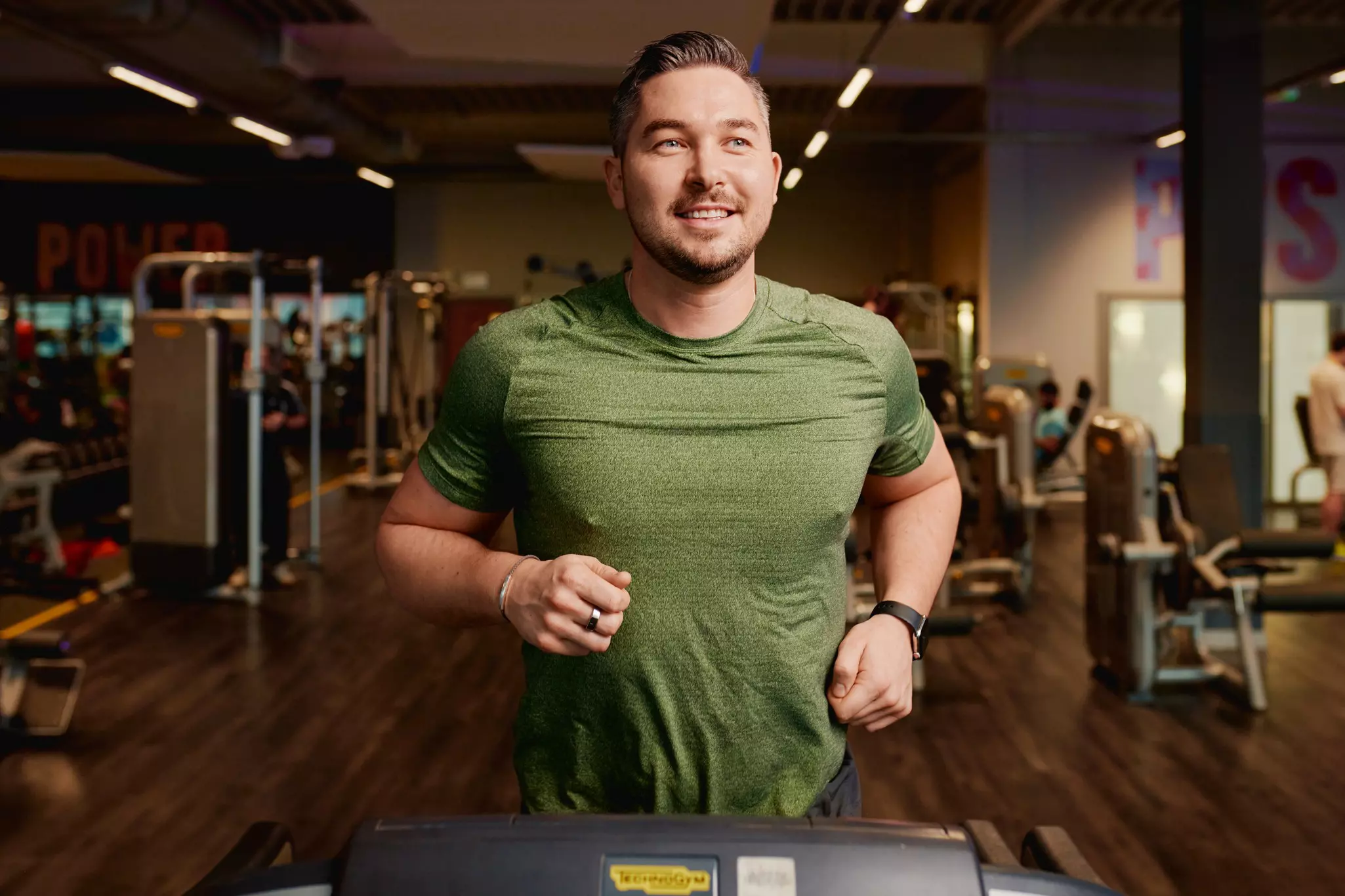 Man running on the treadmill in the gym.