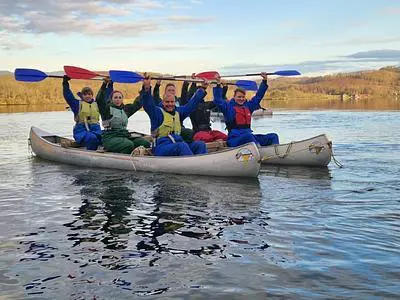 coworkers having a great time in a boat!